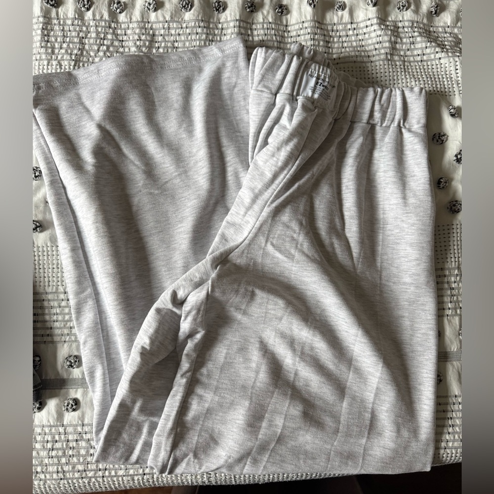 Brand new, light grey flare sweats